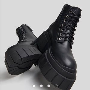 Bershka chunky lace up biker boot in black
